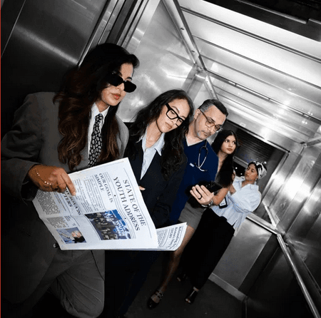 Photo 01 — group in elevator